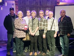 Reserve 107 participants awarded the YMCA Peace Medallion, from left: Young Chippewayan First Nation Gary Laplante; Sylvia Weenie, widow of Chief Ben Weenie; Jason Johnson, pastor of St. John's Lutheran Church in Laird; Laird area farmers Wilmer and Barb  Froese; Dean Dodge, CEO of YMCA Saskatoon; Ray Funk, member of the Laird Mennonite group; and Young Chippewayan George Kingfisher. MCC photo by Jana Al-Sagheer