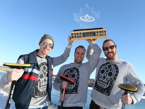 Bryce Lisitza, Derek Larsen and Darryl Finch hold up their Canadian Gay Curling Championship trophy in Saskatoon on February 14, 2017.