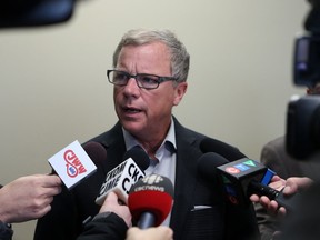 Premier Brad Wall speaks to media at Ecobain Gardens in Saskatoon on Feb. 28, 2017.