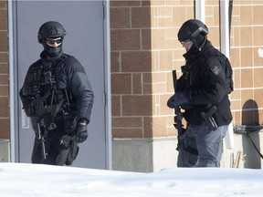 Two people were taken into custody after Saskatoon police executed a high-risk search warrant at a home on 33rd Street West on Feb. 7, 2017