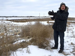 Saskatoon, SK - January 31, 2017 - Swale Watcher John Penner points to the road which is being built through the Meewasin Northeast Swale in Saskatoon on January 31, 2017. (Michelle Berg / Saskatoon StarPhoenix)