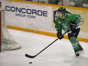 Huskies forward Josh Roach moves the puck during the game against the Manitoba Bisons at Rutherford Rink in Saskatoon on February 4, 2017.