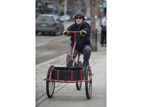 EBRUARY 21/2017-0222-NEWS-SPEC- Roy Hargreaves who designed and built his own custom bike for winter, rides it along Broadway Avenue in Saskatoon on Feb. 21, 2017.