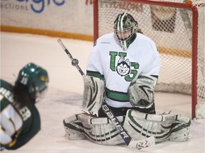 U of S goalie Cassidy Hendricks makes a save during the first period as the University of Saskatchewan Huskies take on the University of Regina Cougars in Canada West Final of CIS Women's Hockey at Rutherford rink in Saskatoon, SK. on Saturday, March 1, 2014. (LIAM RICHARDS/STAR PHOENIX)