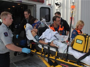 Sixteen students from Saskatchewan Polytechnic's advanced care paramedic program had the opportunity to work with the Shock Trauma Air Rescue Society (STARS) air ambulance on patient transfers in four high-stress scenarios on Feb. 24, 2017. Including two respiratory emergencies, a burn injury and a head injury, students were asked to make critical decisions they would face in a real-life rescues as they transferred a high-tech mannequin from a traditional ambulance to the STARS Air Ambulance. (Morgan Modjeski/The Saskatoon StarPhoenix)