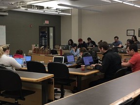 Students at the University of Saskatchewan's College of Law take part in a research-a-thon to help people affected by the U.S. refugee ban.