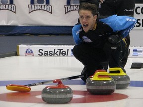 Regina Highland's Adam Casey calls the sweep during Sunday's SaskTel Tankard win over Saskatoon Nutana's Steve Laycock.