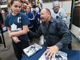 Former NHL star Wendel Clark, shown here signing autographs in Windsor, was a special guest for his former junior team, the Saskatoon Blades, and their Hometown Heroes game Saturday. (DAN JANISSE/Windsor Star)