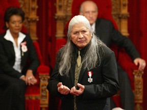 Gordon Tootoosis does a reading at the installation of Michaelle Jean (left) as Canada's 27th governor general in 2005.