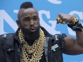 FILE - In this May 17, 2016, file photo, actor Mr. T poses for photographers after High-Wire Artist Nik Wallenda walked a tight rope in New York in honor of National Amazing Month. ABC announced Wednesday, March 1, 2017, that Mr. T is a cast member on the upcoming season of &ampquot;Dancing with the Stars.&ampquot; (AP Photo/Mary Altaffer, File)