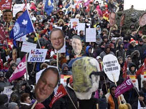 Hundreds attend a March 8 rally at the Legislative Building protesting cuts by the Sask. Party government which could include 3.5 per cent in compensation cuts to the public sector and changes to the way school boards and health regions are operated.