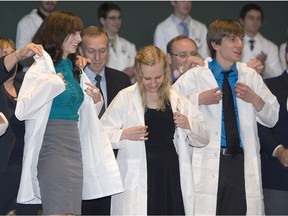 SASKATOON, SASK.: -- SEPTEMBER 24, 2010 -- it was a exciting day for 84 College of Medicine students at the University of Saskatchewan who received their white coats on stage at Convocation Hall welcoming them to study the medical profession, September 24, 2010 (Gord Waldner/Star Phoenix).
