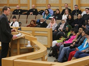Mayor Charlie Clark speaks to members of the public during the opening ceremony for Cultural Diversity and Race Relations Month at City Hall in Saskatoon on March 1, 2017.
