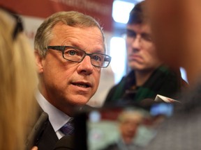 Saskatchewan Premier Brad Wall says the province is considering new taxes as it works to balance its budget.