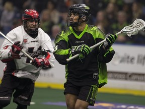 Saskatchewan Rush defender Jeff Cornwall carries the ball as Vancouver Stealth Defence Chris O'Dougherty closes in at the SaskTel Centre in Saskatoon, Saskatchewan on Friday, January, 27, 2017. (Saskatoon StarPhoenix/Kayle Neis)