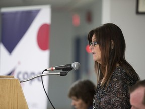 Kim Wilson, the president of COPE 397 speaks on Saskatchewan Crown Corporations during a town hall meeting on privatization in Saskatoon on March 2.