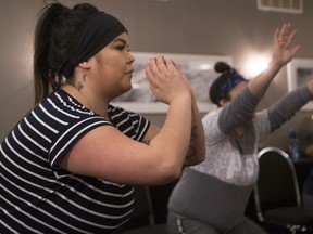 Whitney Daniels practices an exercise during a fitness session for the Sisters in Action Workshop at the Sandman Hotel in Saskatoon, SK on Wednesday, March 8, 2017.