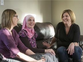 Doha Kharsa, centre, who made it to Canada as a refugee originally from Syria, is now living in Saskatoon. Two Saskatoon women, Jocelyn Orb, left, and Kyla Avis, right, are looking to raise enough funds to make a reunion of the Kharsa with two siblings possible.