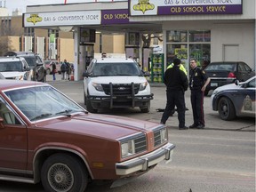 A 14-year veteran of the Saskatoon Police Service was seriously injured when he was struck by a vehicle near the intersection of Idylwyld Drive and 33rd Street on Tuesday afternoon. The officer, 37, was investigating a report of a stolen car in the area. He was taken to hospital with what were described by police as serious but not life-threatening injuries. Officers had been called about a vehicle stolen from Edmonton Avenue around 3:55 p.m. One of them spotted it in the 300 block of Avenue T North and tried to stop it. “While he was investigating, the suspect got out of the vehicle and fled. The officer pursued and during that time was struck by a vehicle,” police spokeswoman Kelsie Fraser said. Police do not have a suspect in custody. The vehicle that was stolen had been left running with the keys left inside, Fraser added. The suspect is described as a man in his mid-20s, wearing a black and white wind jacket, dark coloured pants and a ball cap. He’s believed to have facial hair, possibly a moustache.