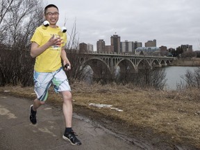Joggler Julian Tam runs while juggling along the Meewasin Trail near the University bridge in Saskatoon, SK on Thursday, March 30, 2017.
