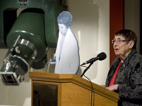SASKATOON,SK--NOVEMBER  04/2011--The Honourable Sylvia Fedoruk speaks to an audience gathered for the opening of the Cancer Bomb Exhibit as the cobalt 60 cancer treatment turns 60, at the Western Development Museum Sunday, December 04, 2011. The photo in the background is of a young Fedoruk  with the original machine. (GREG PENDER/STAR PHOENIX)