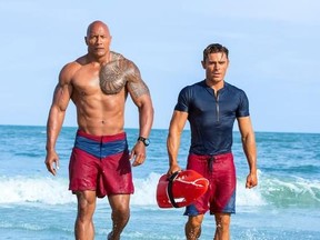 This image released by Paramount Pictures shows Dwayne Johnson, Left, and Zac Efron in a scene from, &ampquot;Baywatch,&ampquot; in theaters May 25. (Frank Masi/Paramount Pictures via AP)