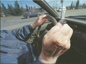 Illustrating an elderly driver behind the wheel of a vehicle.