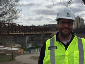 Dan Willems, Saskatoon's special projects manager for major projects and preservation, stands in front of the new Traffic Bridge as construction hits the halfway mark on April 20, 2017.
