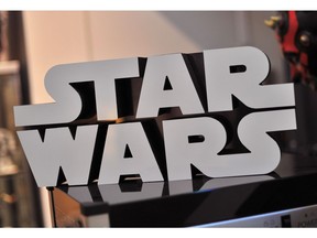 (FILES) This file photo taken on November 24, 2015 shows aStar Wars logo sign inside Rancho Obi-Wan, the world's largest private collection of Star Wars memorabilia, in Petaluma, California. The next chapter in the beloved blockbuster "Star Wars" saga has a title: Episode VIII will tell the tale of "The Last Jedi." Lucasfilm on January 23, 2017 released the title without additional explanation. The film, directed by Rian Johnson, is due in theaters on December 15, 2017.  /