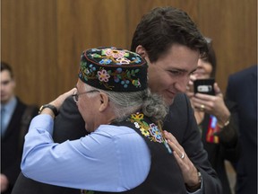Canadian Prime Minister Justin Trudeau meets with Metis National Council president Clement Chartier during the Crown-Metis Nation Summit in Ottawa, Thursday April 13, 2017.