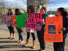 Roads were closed in both directions in front of the North Battleford courthouse as close to 50 people gathered with posters on Thursday, April 6. Andrea Hill photo