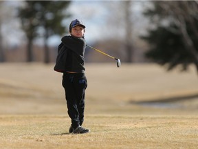 Six-year-old Aiden Long plays his first round of golf of the season at Wildwood golf course in Saskatoon on April 2, 2017. He has been playing golf for two years.