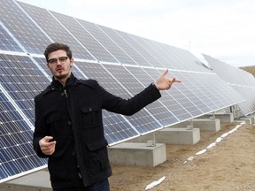SASKATOON, SK - April 25, 2017 - Sask Polytechnic mechanical engineering student Cody Leusca explains how the solar panel's angle changes to optimize sun exposure at one of the first solar power generation co-operatives in the province at the Landfill Gas Power Generation Facility in Saskatoon on April 25, 2017. (Michelle Berg / Saskatoon StarPhoenix)