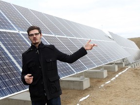 SASKATOON, SK - April 25, 2017 - Sask Polytechnic mechanical engineering student Cody Leusca explains how the solar panel's angle changes to optimize sun exposure at one of the first solar power generation co-operatives in the province at the Landfill Gas Power Generation Facility in Saskatoon on April 25, 2017. (Michelle Berg / Saskatoon StarPhoenix)