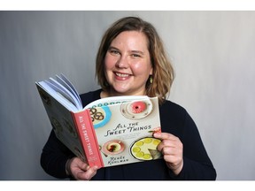 Renee Kohlman with her first cookbook All the Sweet Things.