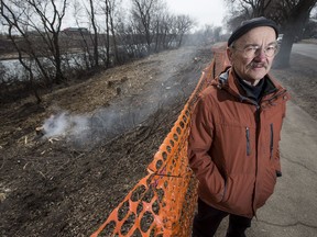 Richard Kerbes, who is concerned about the trees being cut down to make way for a widening of the Meewasin trail along Spadina Crescent East, stands for a photograph along the work site in Saskatoon, SK on Monday, April 17, 2017.