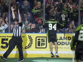 Saskatchewan defender Matt Hossack celebrates with fans after scoring a goal during Saturday's win over the Toronto Rock.