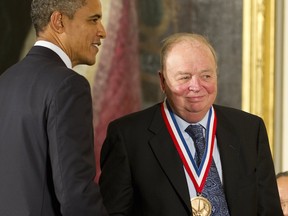 U.S. President Barack Obama presents the National Medal of Technology to Donald Bateman in 2011.