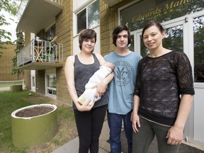 SASKATOON,SK--MAY 24/2017 - Cecile Desjarlais, left to right, and Winter Sage Hogan in front of their Camponi apartment with baby Roderick and Camponi Housing Wrap-around coordinator Heather Rattanavong. (Saskatoon StarPhoenix/Liam Richards)