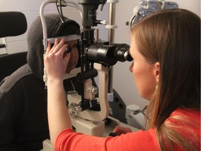 Dorian Frenchman, a Grade 7 student at Confederation Park Community School, gets his eyes tested during a recent exam at the school as part of the Eye See Eye Learn Program. With tests done on site at school, the program helps ensure students have the glasses they need while teaching them and their parents about the importance of eye and vision health.(Morgan Modjeski/The Saskatoon StarPhoenix)