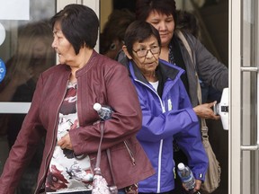 MEADOW LAKE — Jackie Janvier, mother of Marie Janvier, centre, and supporters leave the courthouse during a break in the sentencing hearing for a teen who killed four people, on Tuesday May 16, 2017. Brothers Drayden, 13 and Dayne Fontaine, 17, teacher Adam Wood, 35, and teacher's aide Marie Janvier, 21 were killed during the shootings in La Loche, Sask. on January 22, 2016. Seven others were injured.