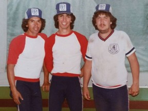 Joe Gallagher (left) poses with sons Brian and Dennis during their playing days.