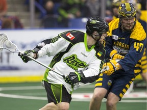Saskatchewan Rush forward Ben McIntosh moves the ball against the Georgia Swarm in NLL Lacrosse action on March 12, 2016, the Swarm's only other appearance in Saskatoon.