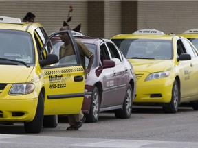 Saskatoon taxi companies and drivers are lobbying city hall to allow them to put more vehicles on the road to meet peak demand. (RICHARD MARJAN/The StarPhoenix)