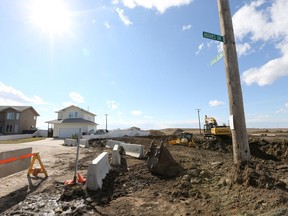 Construction workers are on site in the future Elk Point neighbourhood at the corner of 37th Street West and Hughes Drive in Saskatoon on May 1, 2017. The official plan for this neigbourhood, which will be located west of Hampton Village and Dundonald, hasn't been approved yet.