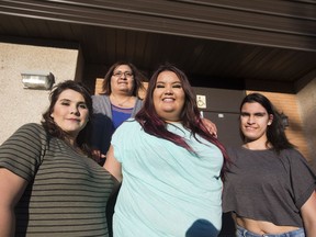 Rachelle Tanton stands with her daughters (L to R) Serina, Megan and Celine off 20th street in Saskatoon.