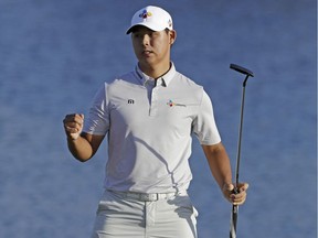 Si Woo Kim of South Korea, celebrates winning The Players Championship golf tournament Sunday, May 14, 2017, in Ponte Vedra Beach, Fla.