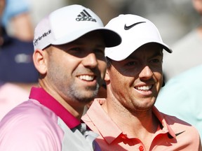 Sergio Garcia of Spain and Rory McIlroy of Northern Ireland look on during a practice round prior to the THE PLAYERS Championship at the Stadium course at TPC Sawgrass on May 10, 2017 in Ponte Vedra Beach, Florida.