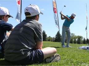 Graham DeLaet gives some pointers during the Graham Slam golf clinic at Riverside Country Club in Saskatoon on June 12, 2017.