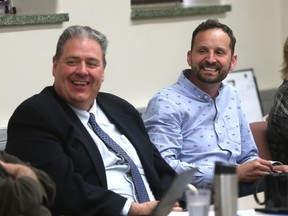 Saskatoon-Meewasin NDP MLA Ryan Meili, right, and the three other Saskatoon NDP MLAs meet with Saskatoon city council, including Coun. Randy Donauer at Saskatoon city hall Wednesday. (MICHELLE BERG/The StarPhoenix)